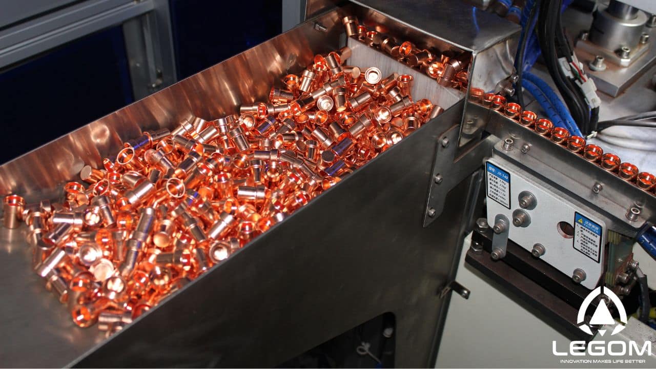 Second automated vibratory feeder line for wax thermostatic element parts at Legom