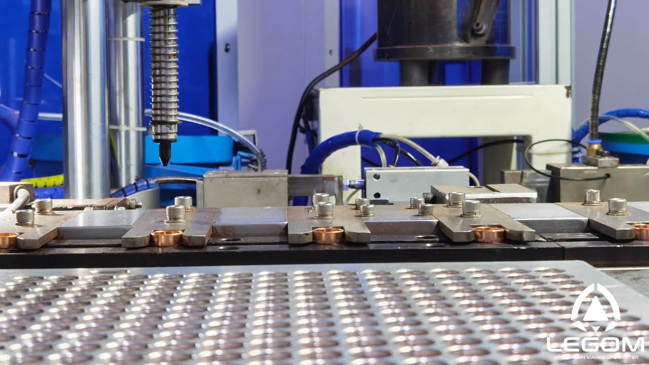 Wax injection filling machine for thermostatic elements at Legom manufacturing