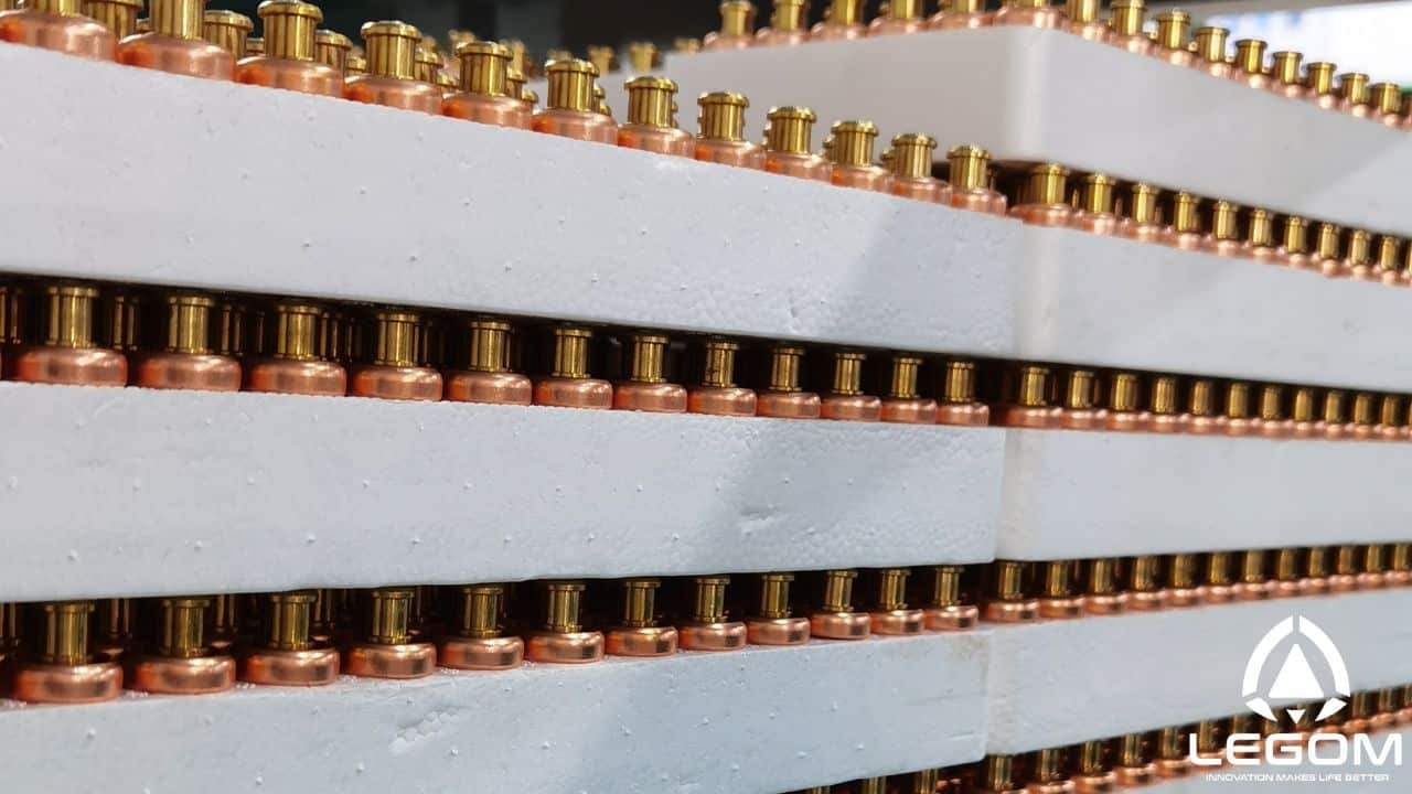 Wax thermostatic elements staged in foam trays on the Legom production line