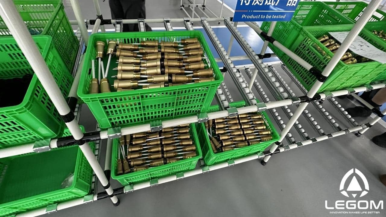 HVAC valve cartridges awaiting testing — Legom production